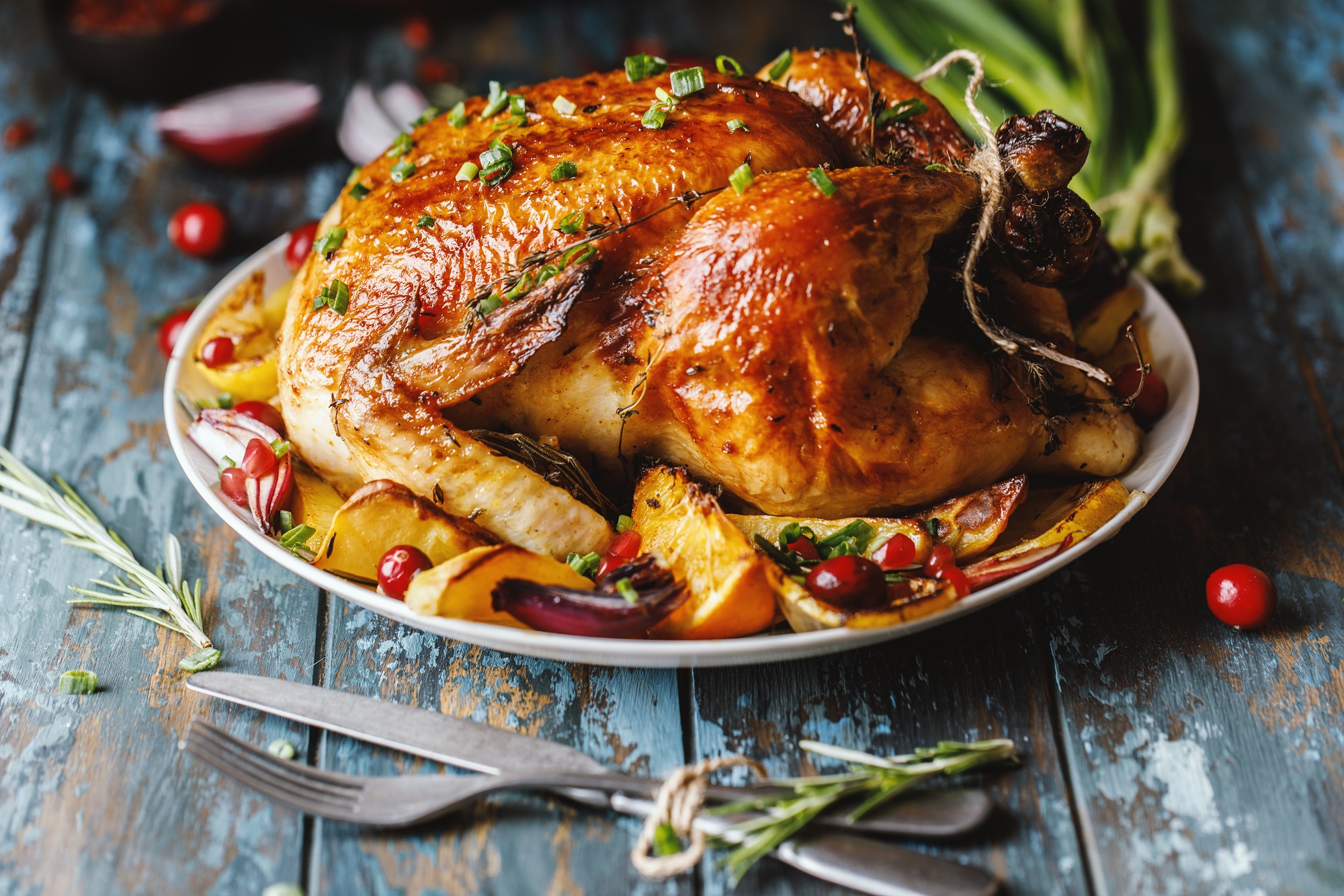 Roast,Whole,Chicken,With,Roast,Vegetables,On,Plate,On,A