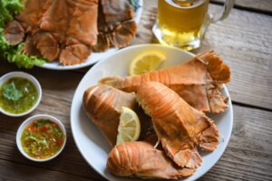 Fresh,Slipper,Lobster,Flathead,Boiled,Cooking,With,Parsley,Rosemary,In