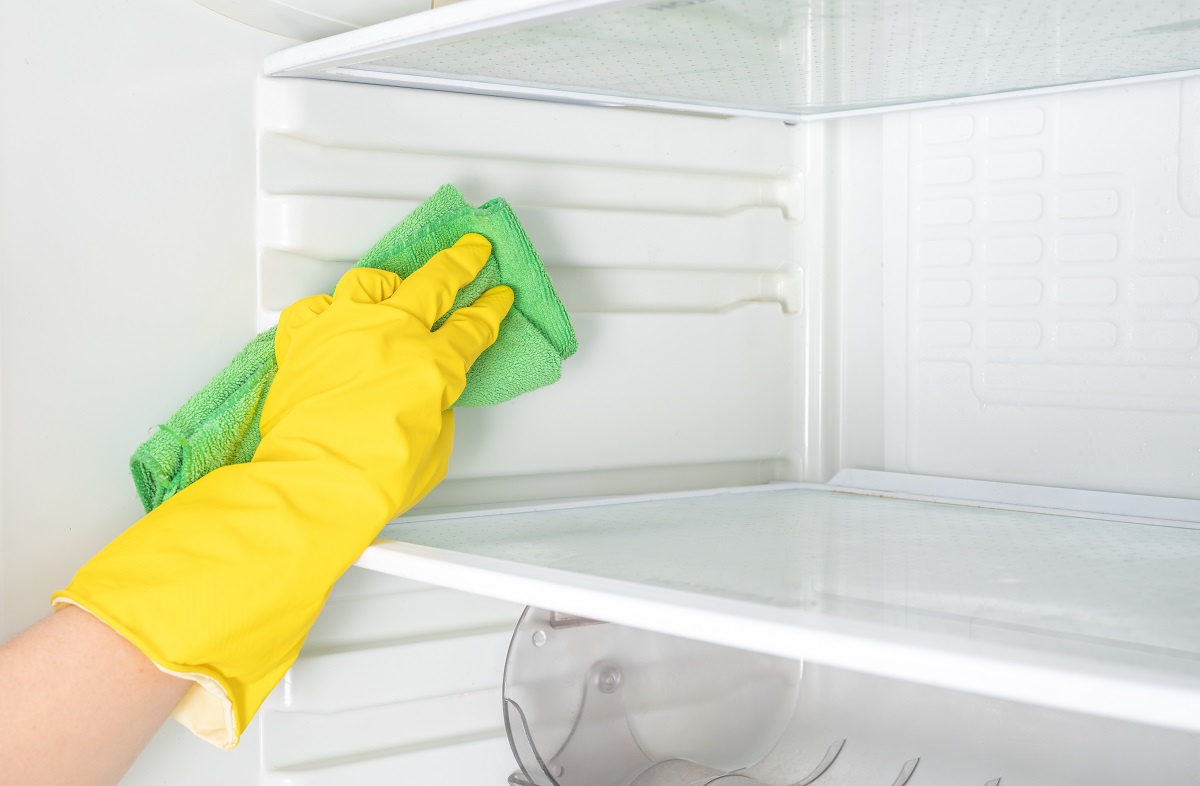Deep,Cleaning,Service.,House,Cleaning.,Washing,Fridge.,Woman,Hand,In