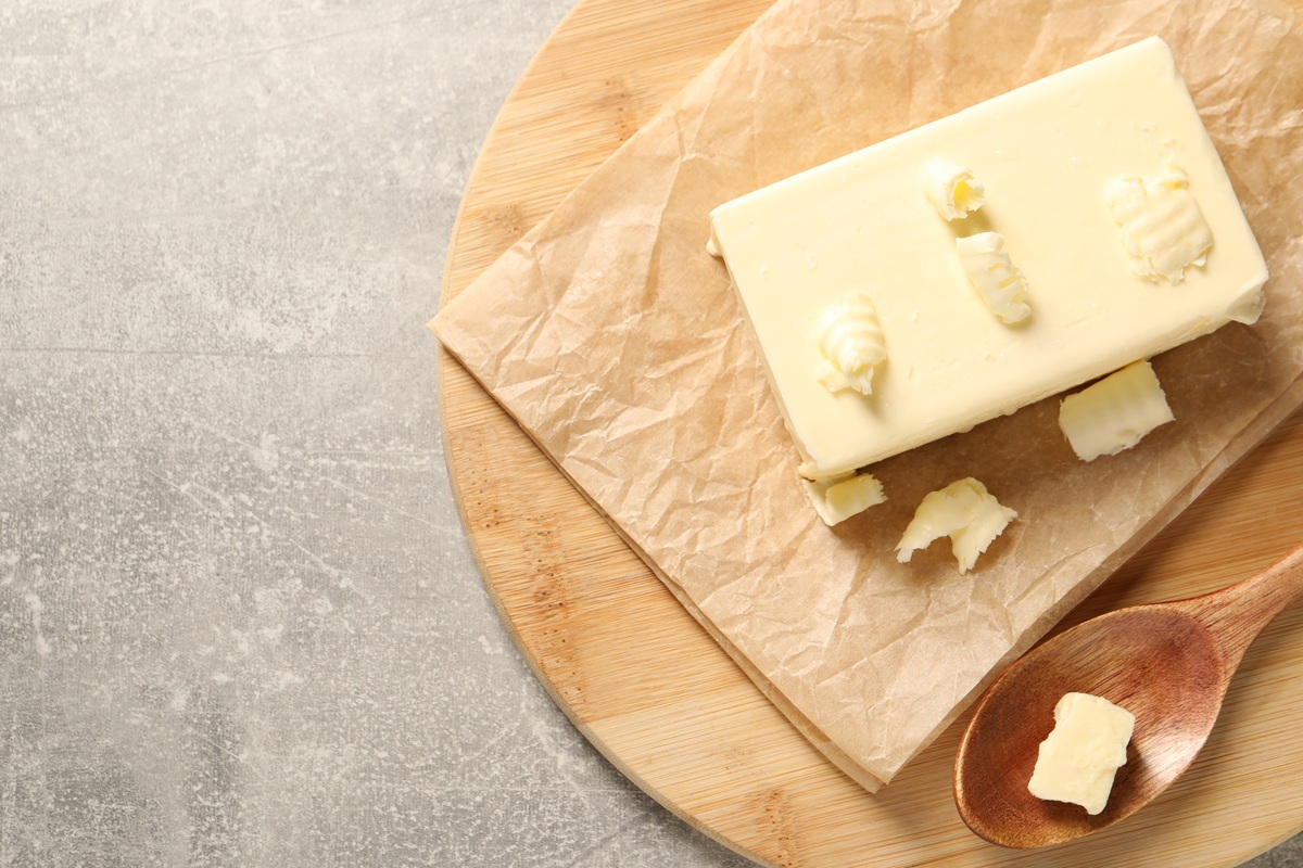 Tasty,Butter,On,Grey,Table,,Top,View.,Space,For,Text