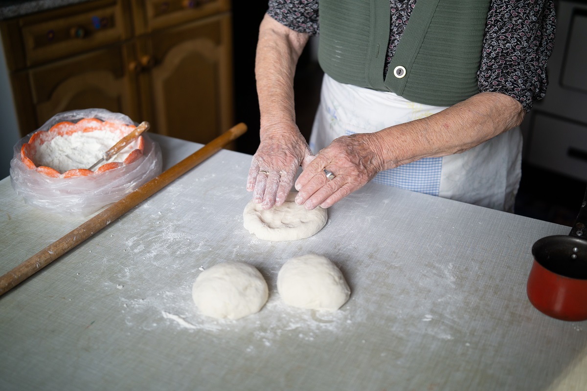 Old,Woman,Kneading,Dough,Close,Up