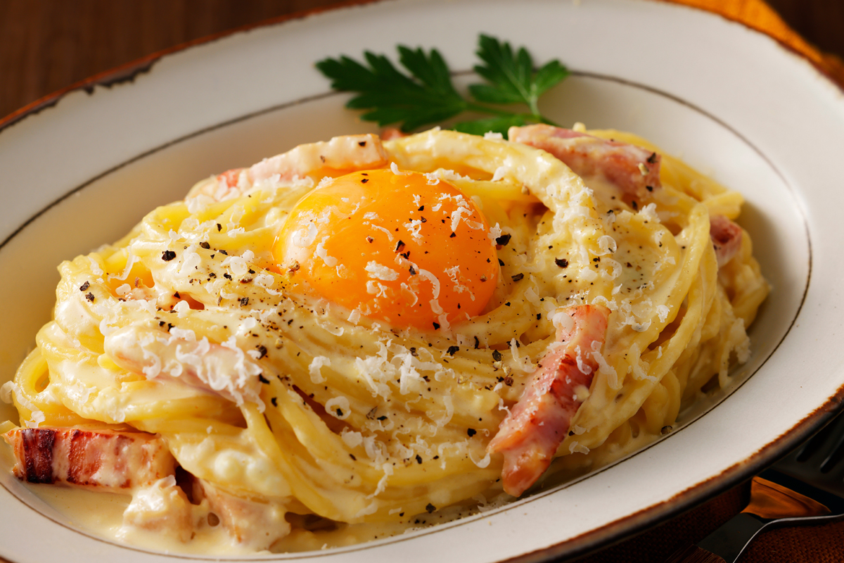 Spaghetti,Carbonara,Topped,With,Egg,Yolk
