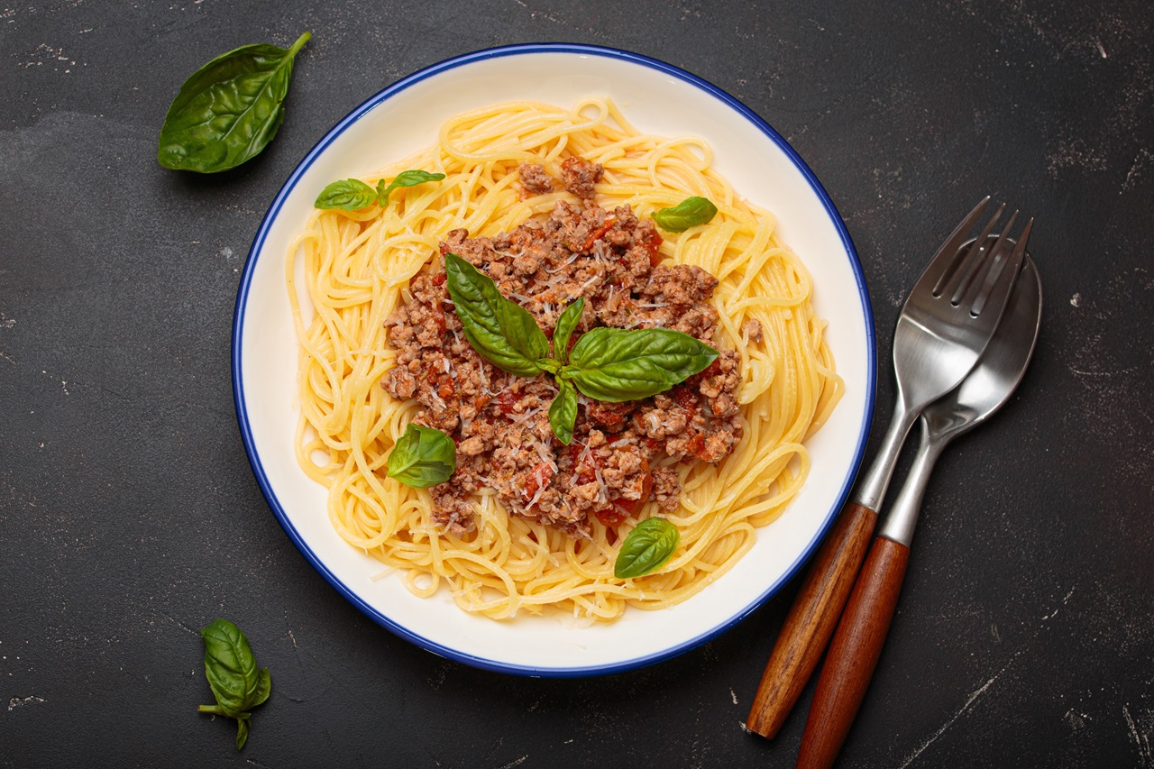Spaghetti,Bolognese,With,Basil,And,Parmesan,On,Dark,Background,,Italian