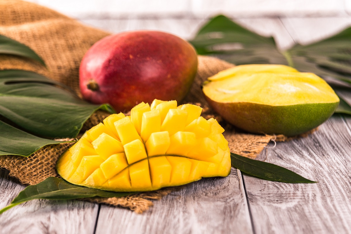 Mango.,Tropical,Fruits.,On,A,Wooden,Background.,Blurred,Background,Selective